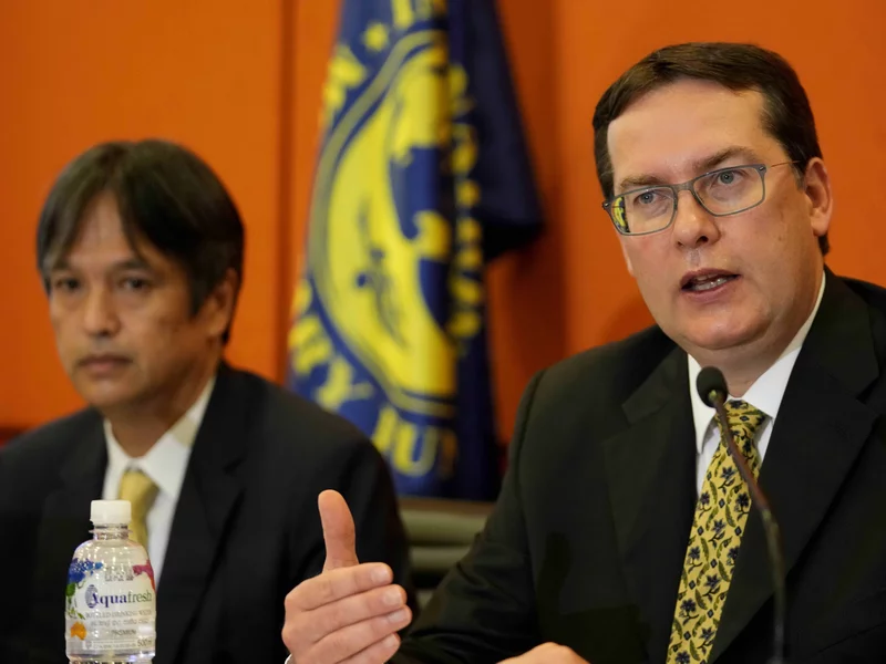 World Bank senior mission chief Peter Breuer, right, speaks with Masahiro Nozaki, mission chief for Sri Lanka, by his side during a media conference in Colombo.