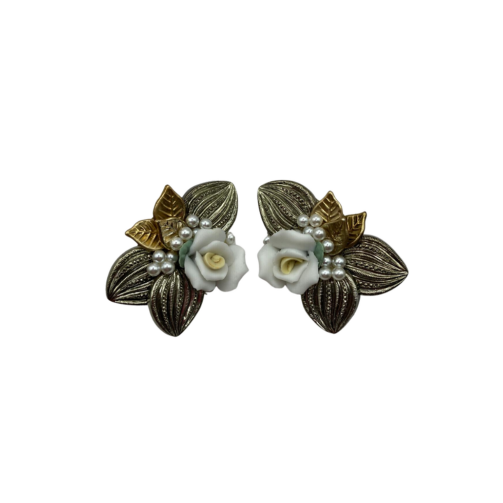 Voorkant vintage rozen clip oorbellen goud en zilver