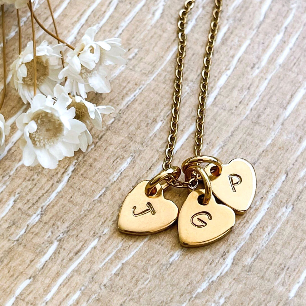 Gold heart necklace with 3 letter charms. Perfect girlfriend gift