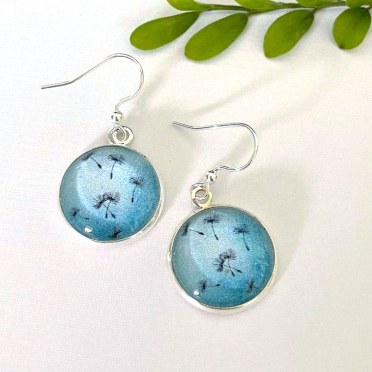 Blue earrings with a dandelion pattern