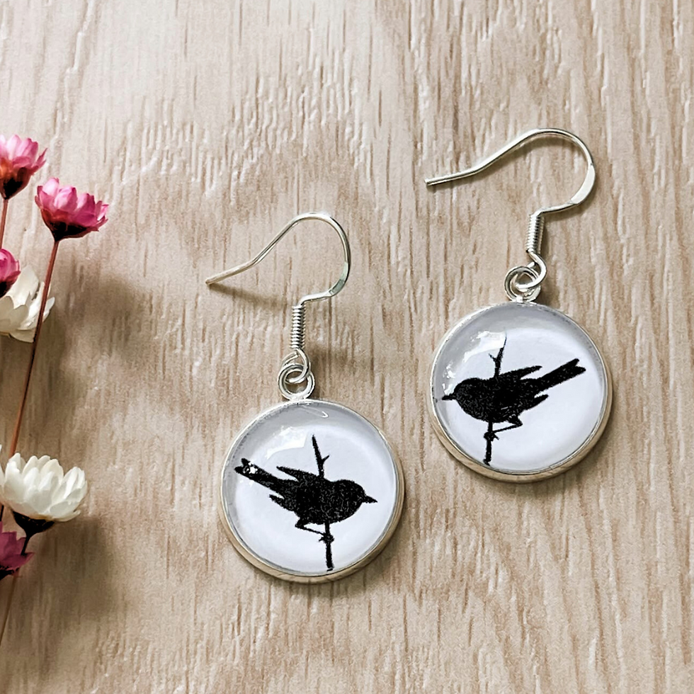Thumbnail: Black bird sitting on a branch earring and pendant set