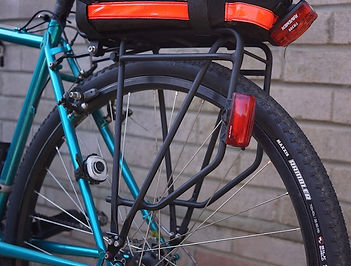 bicycle rear rack and rear red light