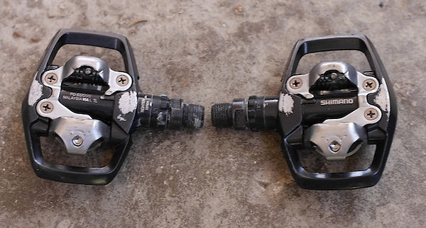 two shimano spd cycling pedals