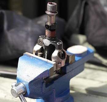 bicycle peal in workshop vice