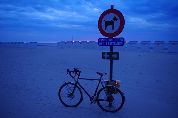 Bike sea side sand light evening summer sign