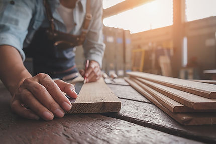 carpenter-working-with-equipment-wooden-table-carpentry-shop.jpg