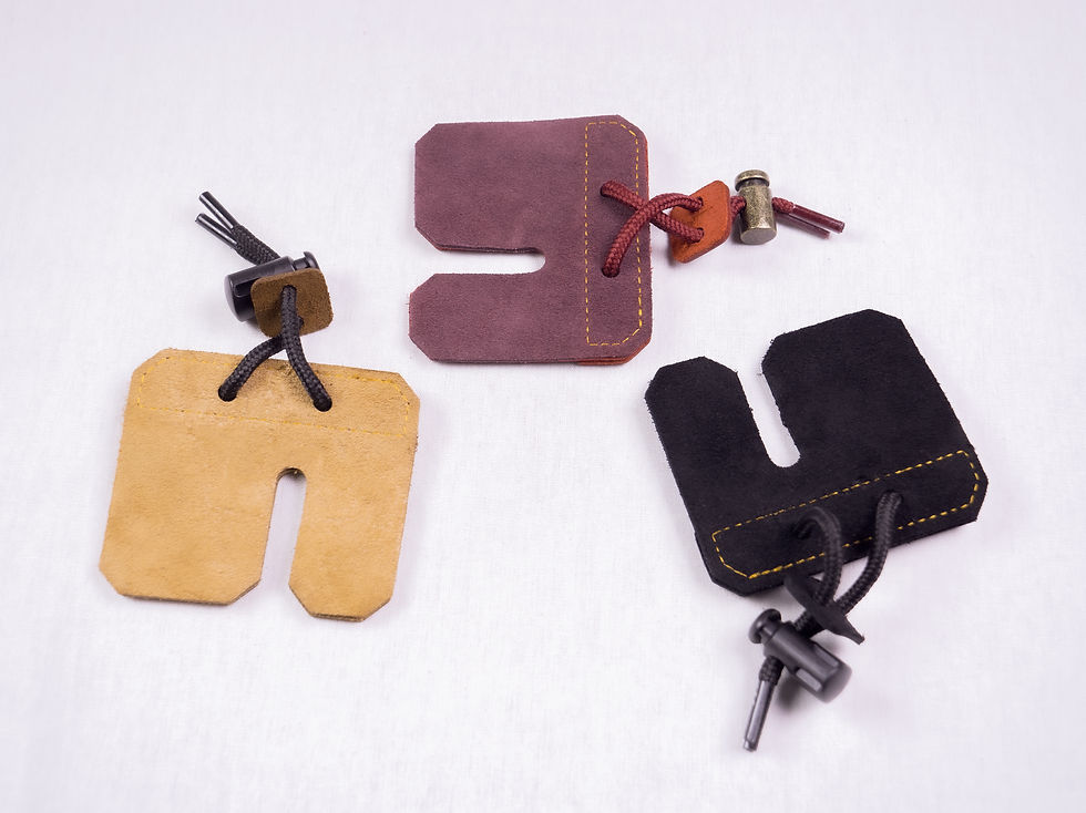 Thumbnail: Novem Archery Leather Tab Trio