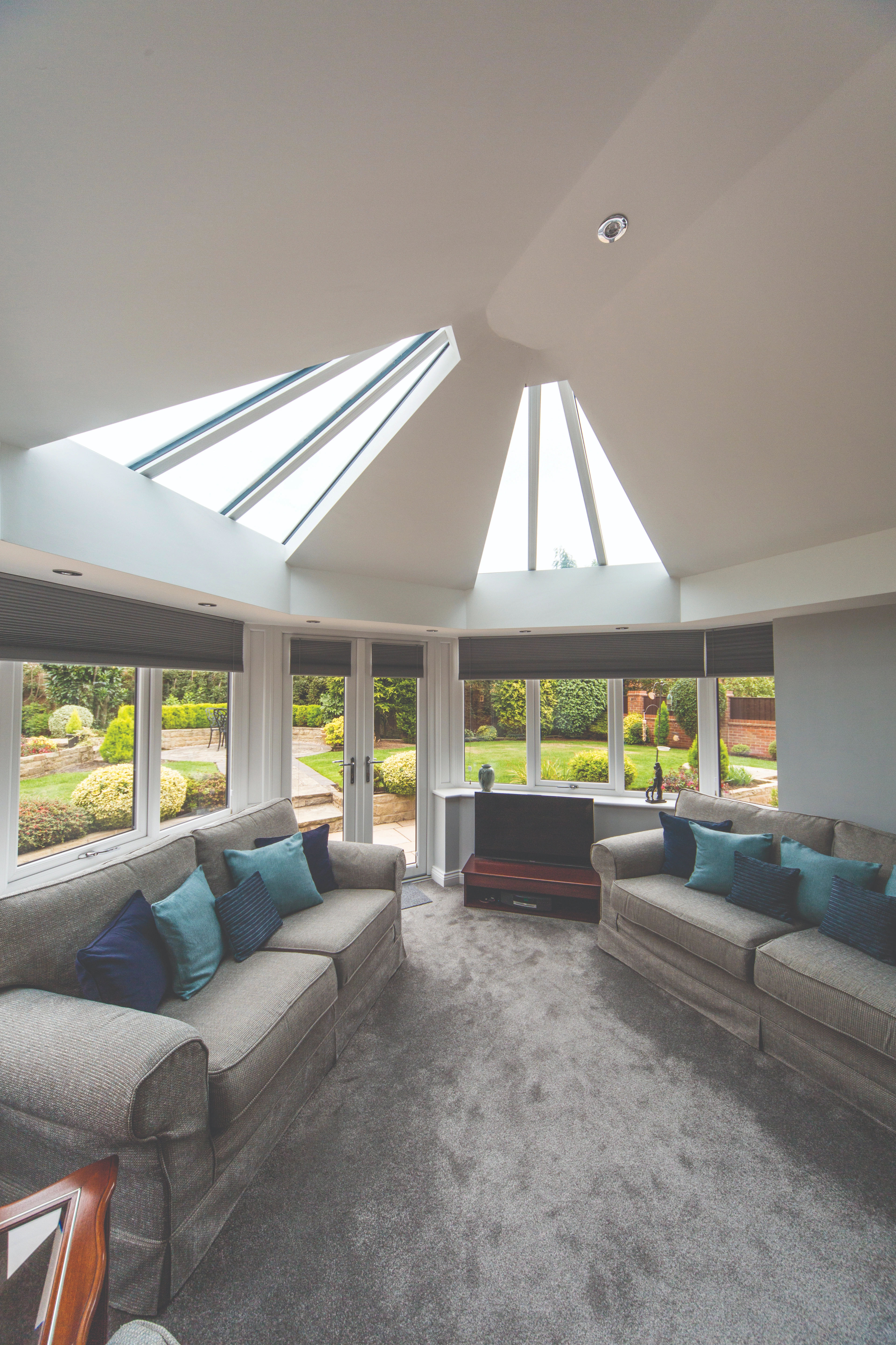 Livinroof hybrid conservatory roof combining solid insulated panels with glass sections