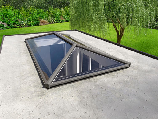 Flat roof extension with Stratus roof lantern flooding kitchen with natural light