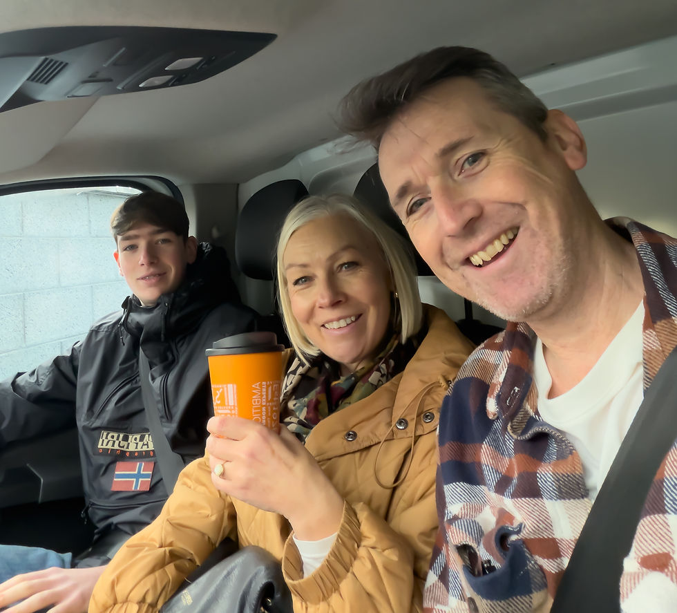 My helpers! Sarah and son Noah in the van on the way to set up!