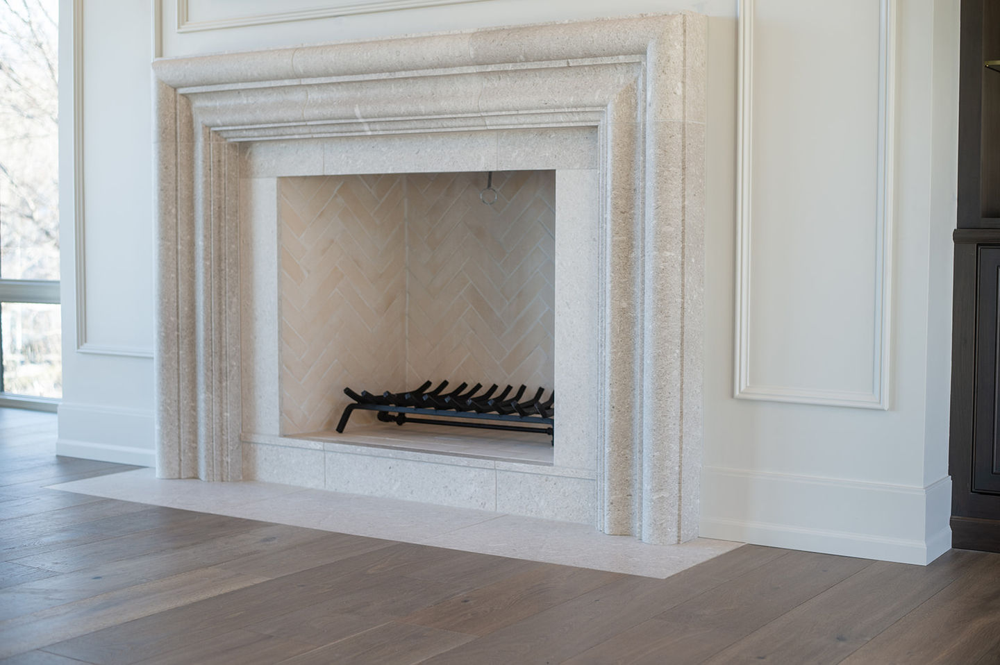 Marble fireplace by  Laura Lien Interior Design