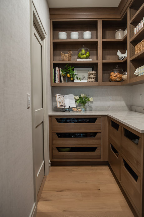 Pantry with oak cabinetry, custom drawers, open shelving and wallpaper by Laura Lien Interior Design
