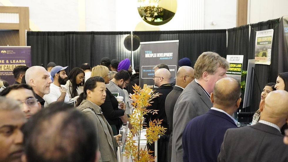 Attendees discussing with exhibitors atLand Buying & Selling Event