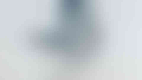 a man in a space suit has the number a328 on his helmet