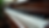 Wide angle view of a keyboard with sheets of music notes