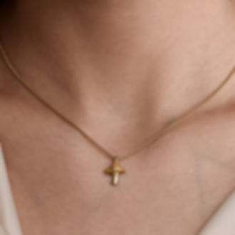 Delicate gold cross necklace