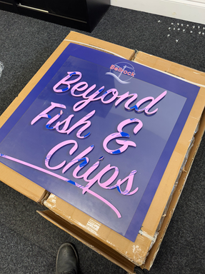 Custom restaurant signage and branding for Bellrock Restaurant in Scotland, including menus, printed hoarding panels and marketing.