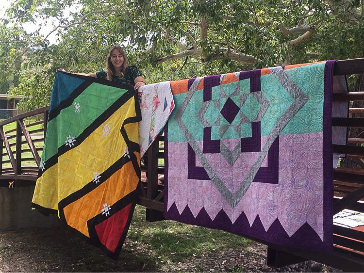 Tori McElwain with her quilt pattern samples on Fort Huachuca, AZ