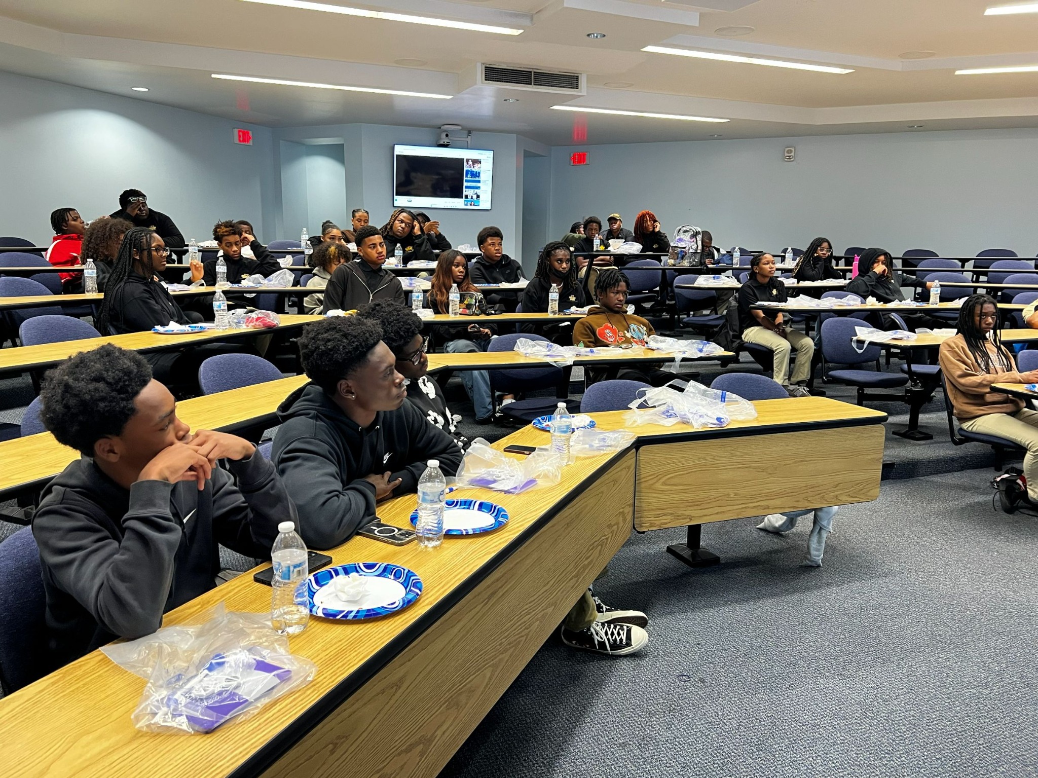 100 Black Men of Coastal North Carolina mentees seated in a classroom during the UNC Pembroke college tour on October 17, 2026.