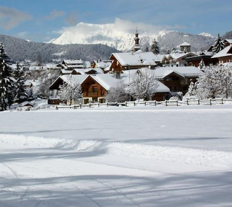 Bozel village under snow, beneath the peaks