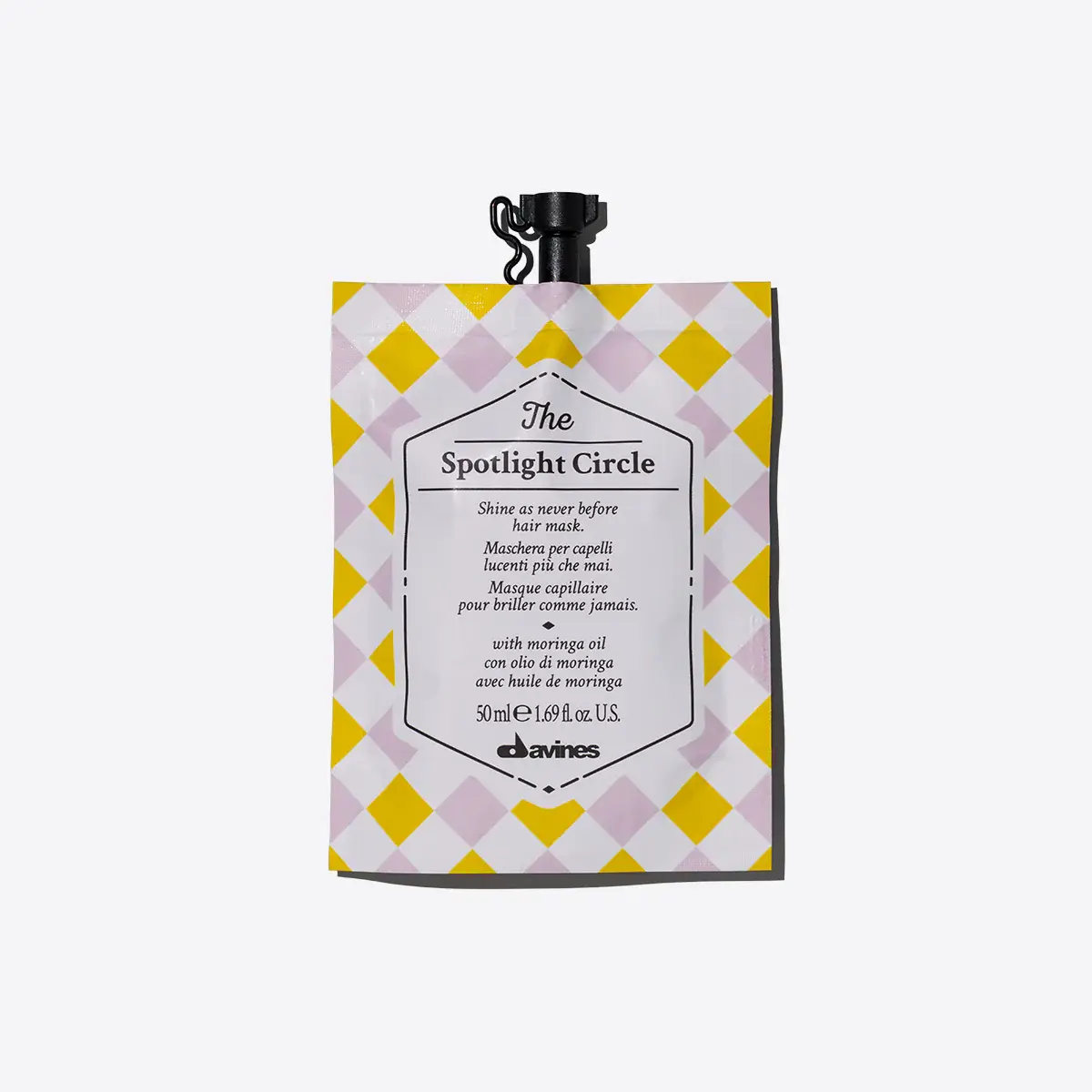Davines Spotlight Circle Hair Mask gives the hair a boost of shine and enhances colour and cut without weighing the hair down