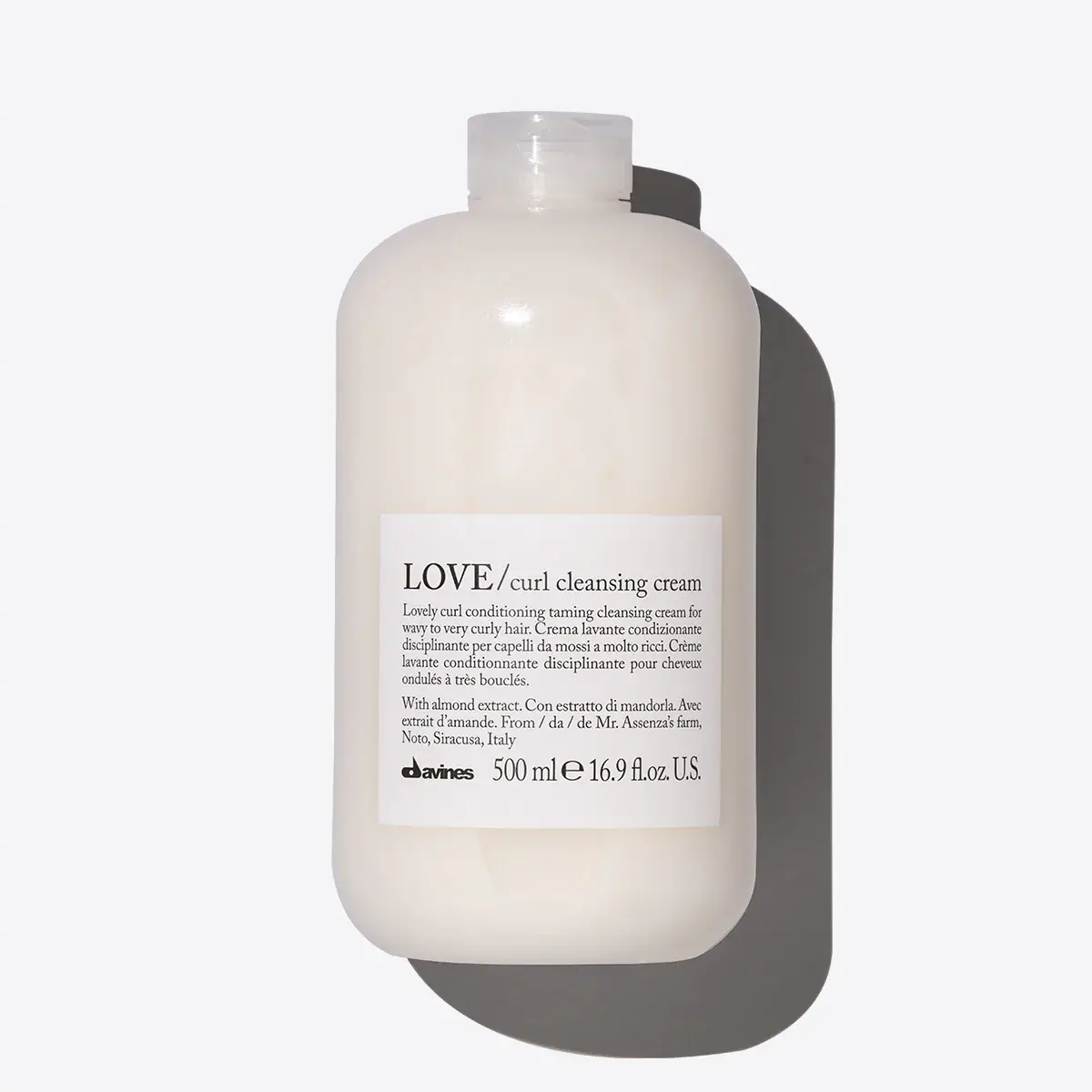 Davines Love Curl Cleansing Cream looks like a light cleansing cream that gently removes impurities and makes the hair
