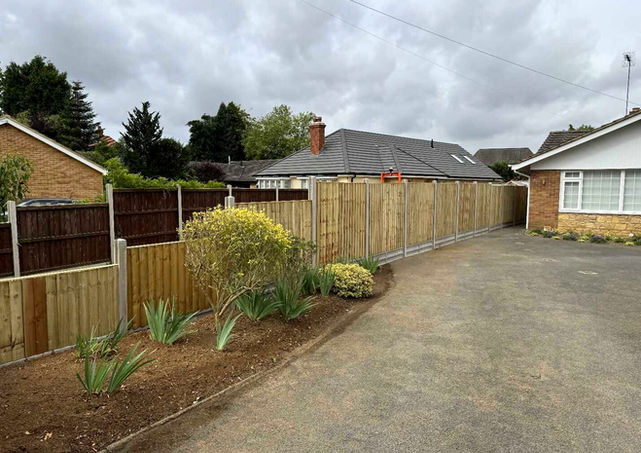 landscaped garden with professional fencing