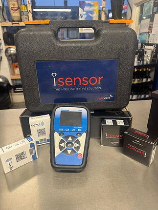 iSensor Diagnostic Tool Kit on table with CAR ACCESSORIES and background details