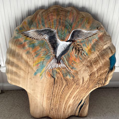 Green memorial headstone carved from oak