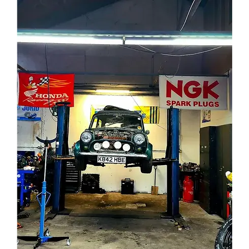 classic mini being repaired at garage