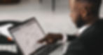 Black guy using laptop | Aster Coop | Family Office Services