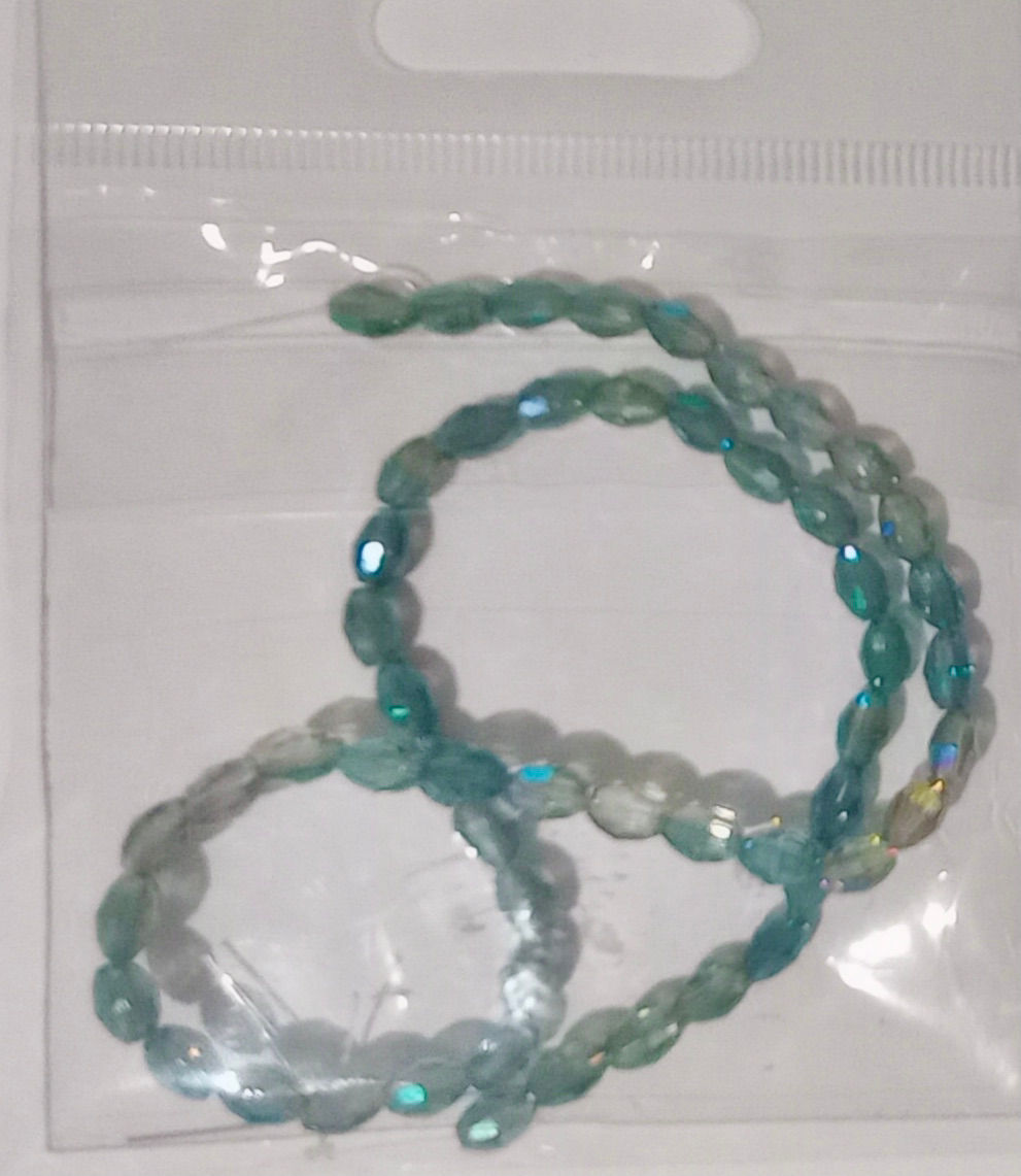 Faceted Rice Bead  Two tone Aqua Blue AB