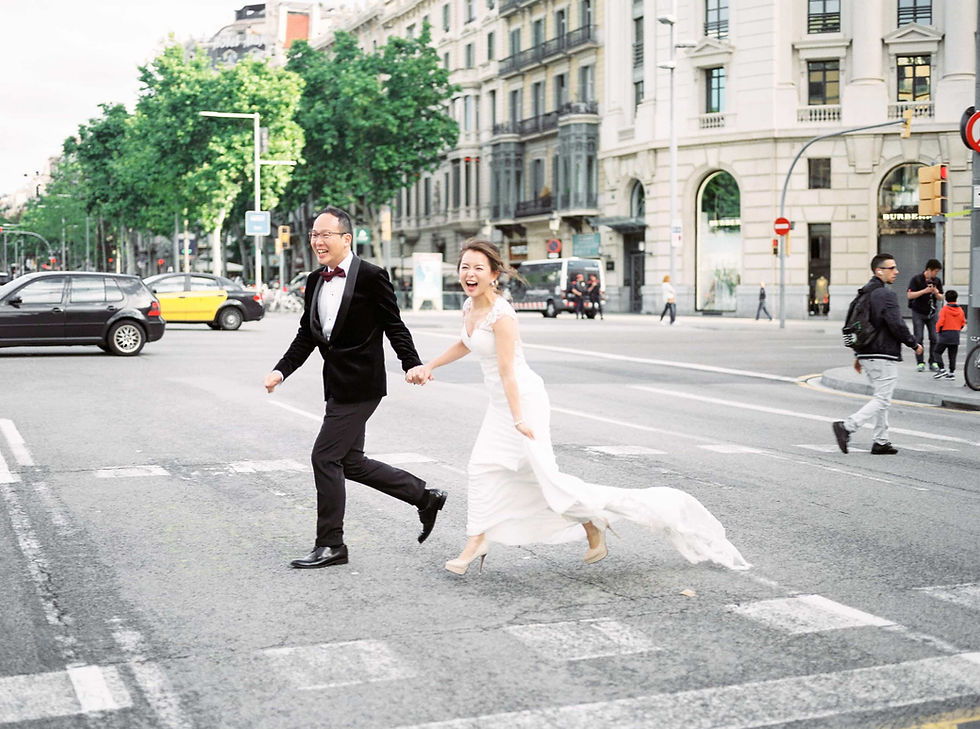bride and groom running across road