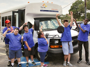 New bus rides the road for expanding day program