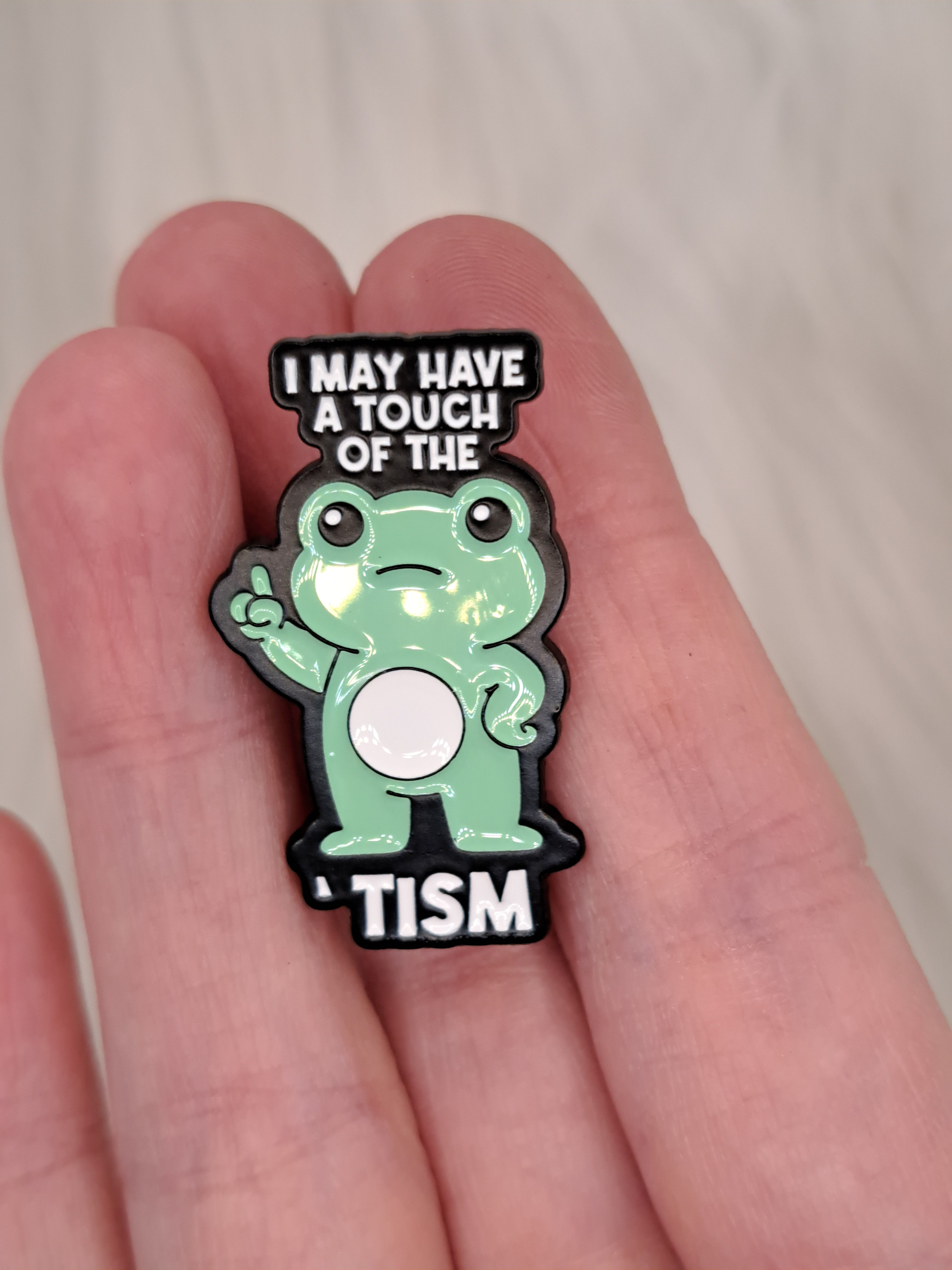 Touch of the Tism pin/badge