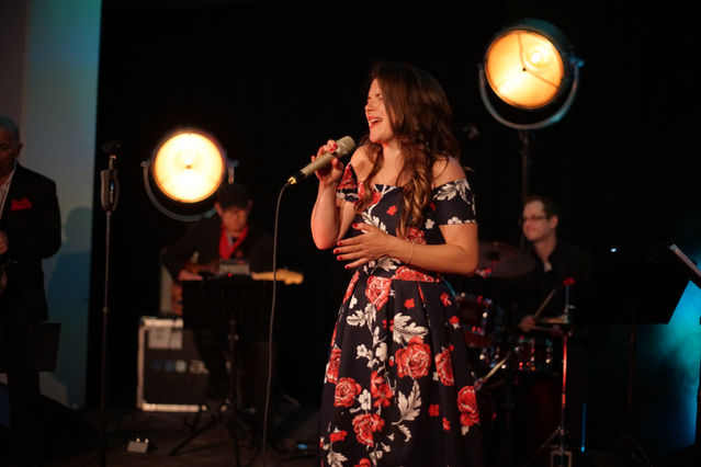 Singer with band