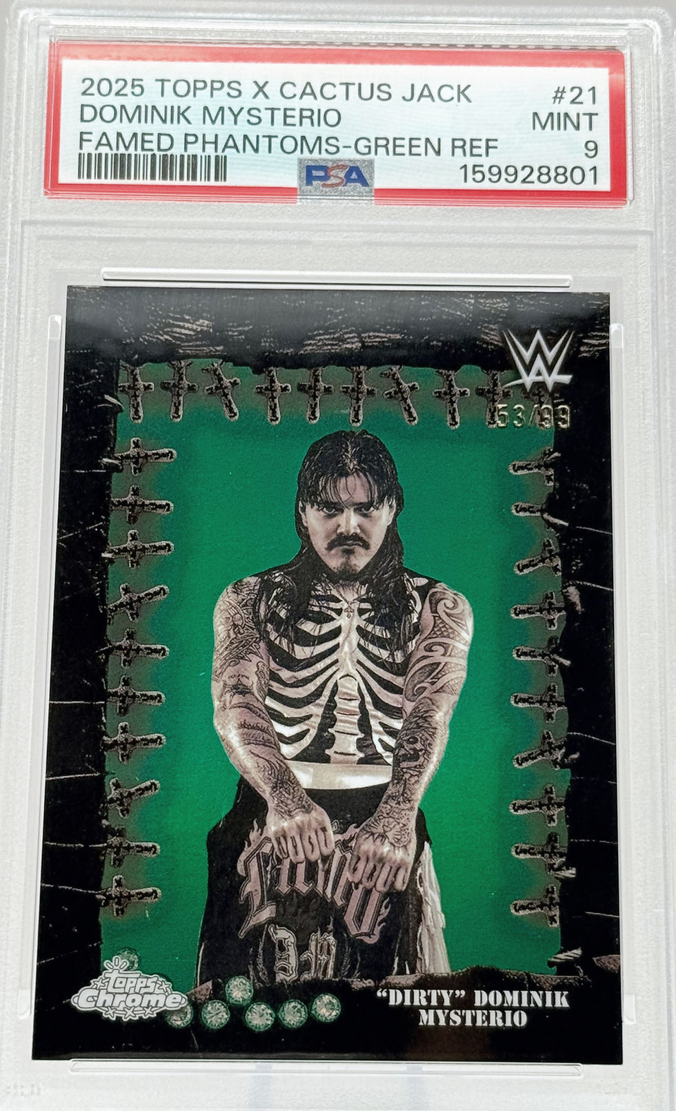 Dominik Mysterio (2025) Topps X Cactus Jack #21 S#53/99 Famed Phantoms Green Refractor Front View