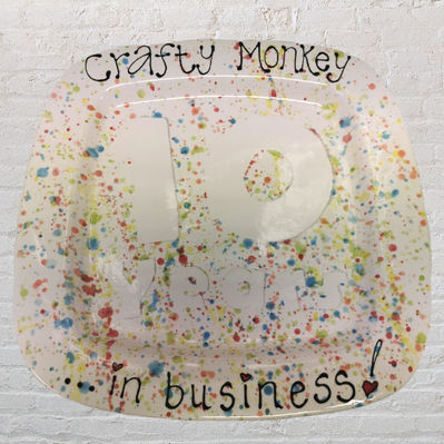 Crafty Monkey 10th anniversary plate to mark 10 years in business made with paint splatters