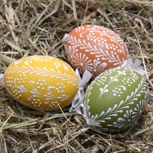 Painted eggs with intricate design of dots and lines