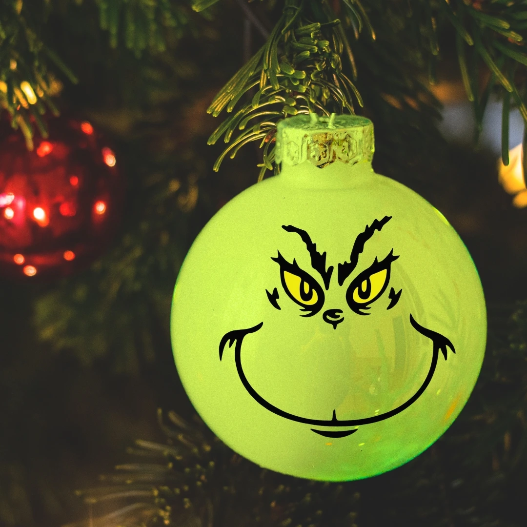 A Grinch design on a bauble.
