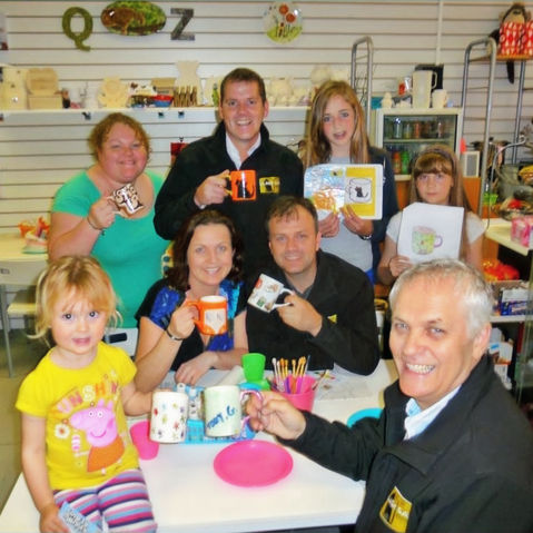 Black Cat Radio Presenters with Crafty Monkey mug painting competition winners.