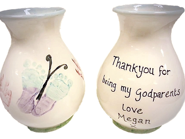 foot-prints-on-vase-godparents_edited.pn