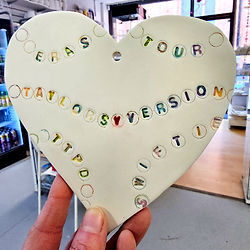 Taylor Swift inspired friendship bracelet heart hanger made at a Crafty Monkey pottery class.