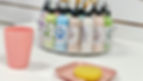 Table with underglaze paints and pink plate at Crafty monkey Studio in St Neots.jpg
