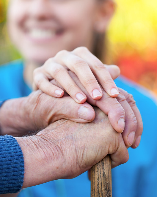 Young female doctor holding his patient