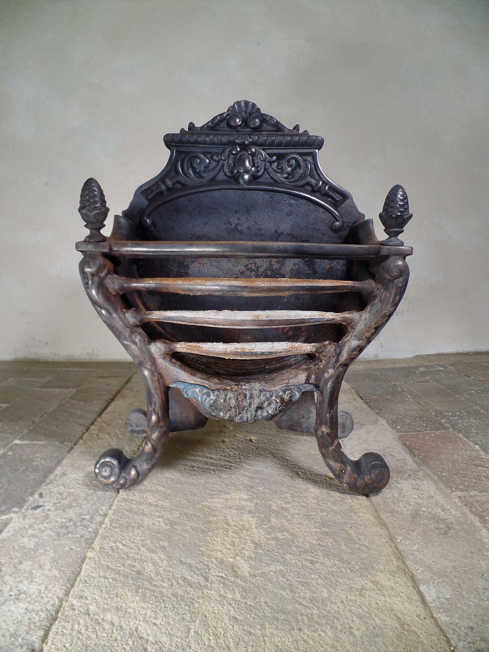 A Cast iron Victorian style fire grate