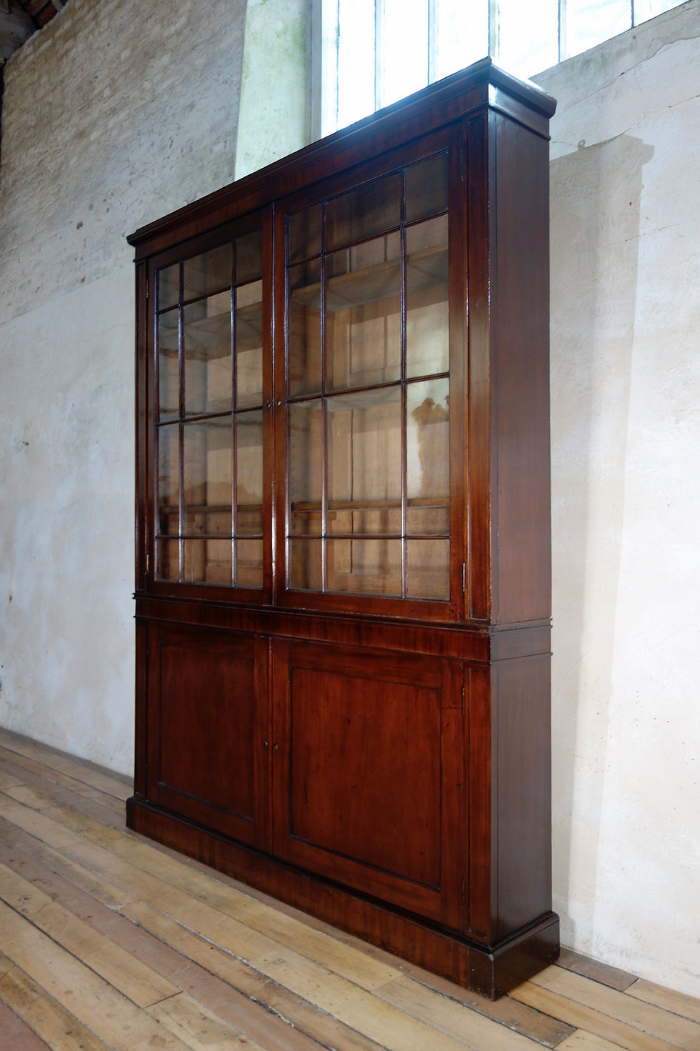 Thumbnail: A Large Narrow Georgian Mahogany Glazed Bookcase