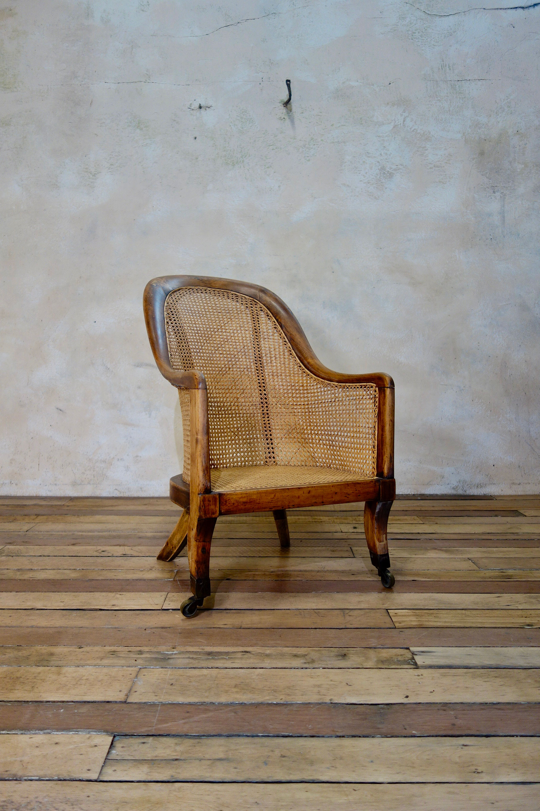 A Regency Caned Bergere Library Tub Chair - Gillows Manner