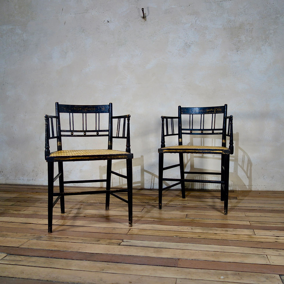 Thumbnail: A Pair Of Regency Ebonised and Caned Armchairs