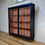 Thumbnail: A 19th Century Ebonised Glazed Sliding Door Apothecary Cabinet